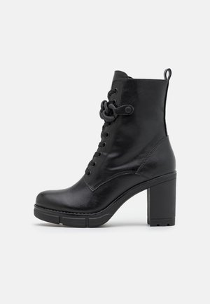 Stivaletti con tacco - black