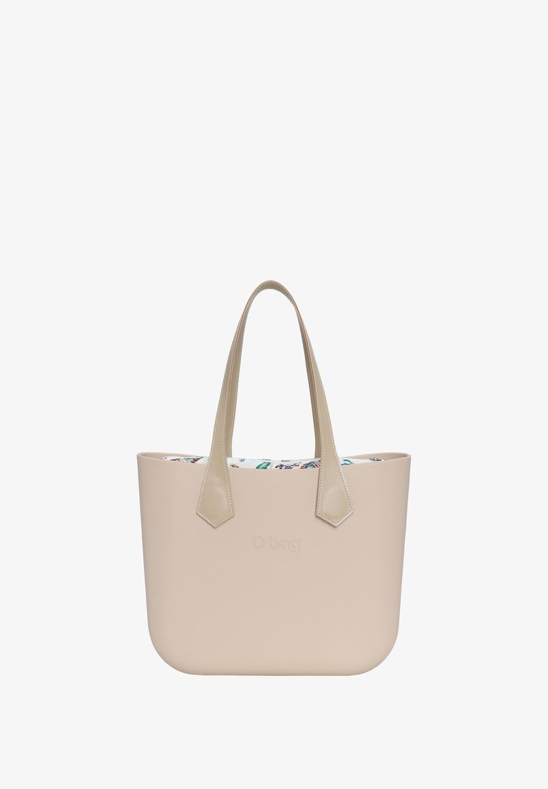 Beżowa torba typu tote wykonana z miękkiego materiału gumowego, z dwiema płaskimi rączkami i kolorowym wnętrzem w kwiatowy wzór. Logo O bag z przodu.