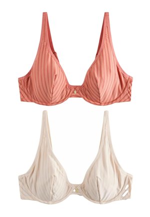 To bøjle-bh'er med lodrette prikkede striber, en i koralpink og en i lysebeige, vist på hvid baggrund.