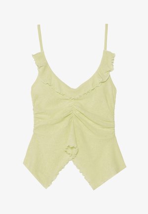 Top sin mangas de color verde claro, hecho de una tela suave, con bordes con volantes, escote en V y detalles fruncidos en el centro.