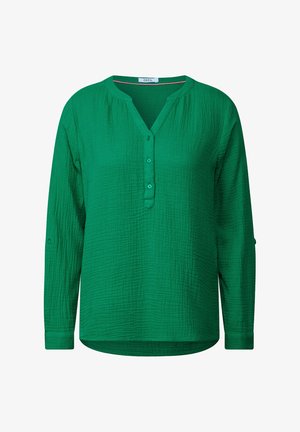 Grøn, langærmet skjorte med et tekstureret stof, V-halsudskæring, tre knapper foran og opsmøgede ærmer.