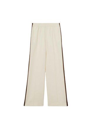 Pantaloni beige a gamba larga con vita elastica, caratterizzati da strisce laterali marroni scure e tasche frontali. Tessuto morbido con vestibilità comoda.