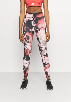 ONPJABINA LIFE TRAIN - Leggings - peachskin/black