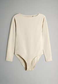 Pikad varrukad bodysuit siledast, heledast beeži kangast. Omab ümarat kaelust ja nööpide sulgemisi allosas. Minimalistlik disain.