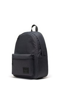 Black backpack with a grid pattern in blue accents. Features a front zip pocket and a top handle. Made of durable fabric. Rounded shape.