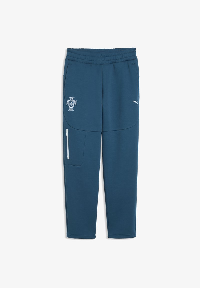 Pantalon de sport bleu avec ceinture élastique, deux poches latérales, une poche zippée blanche sur la jambe gauche, et logos à l'avant.