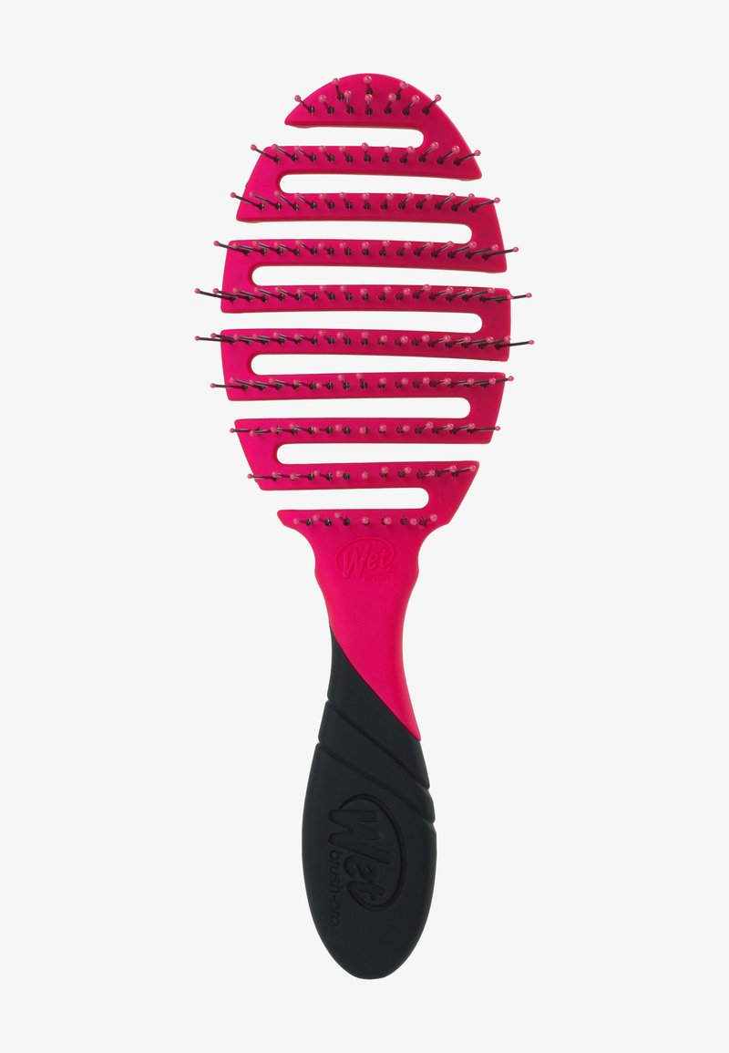 Børste for utredning av hår med en livlig rosa plastkropp, langstrakt oval form, fleksible børstehår og et teksturert svart gummihåndtak.