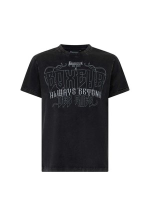 T-shirt noir à manches courtes avec un grand texte stylisé « Boxeur Always Beyond Des Rues » imprimé sur la poitrine en gris.