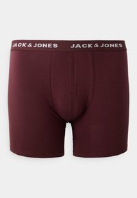 Bordo bokserice izrađene od rastezljivog materijala s mekim pojasom na kojem je u bijeloj boji logo "JACK & JONES". Glatka tekstura, prilagođeni oblik.