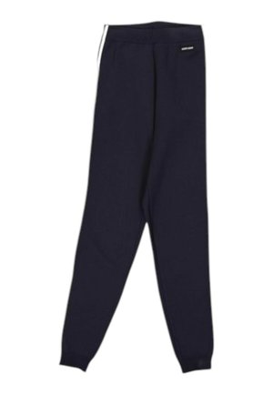 Pantalones de chándal azul marino ajustados con puños elásticos y una pequeña etiqueta con el logo cerca del bolsillo derecho sobre un fondo blanco.