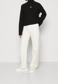 Calvin Klein Jeans Stickad tröja - black