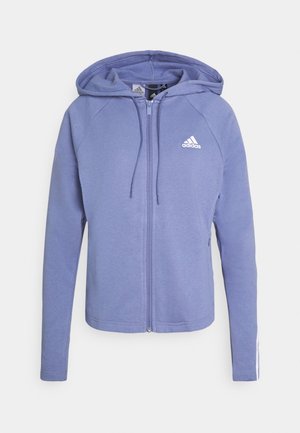 Sudadera con capucha y cremallera de Adidas en lavanda, con capucha y cordones, logo blanco de Adidas en el pecho y mangas largas con sutiles rayas blancas.