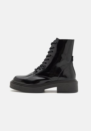 CHINEY - Platform ankle boots - black box