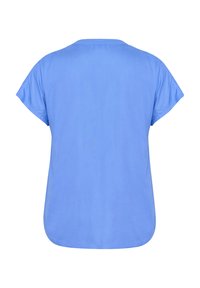Blå kortärmad T-shirt i ett mjukt tyg. Har en rund halsringning, avslappnad passform och en böjd fåll nertill.