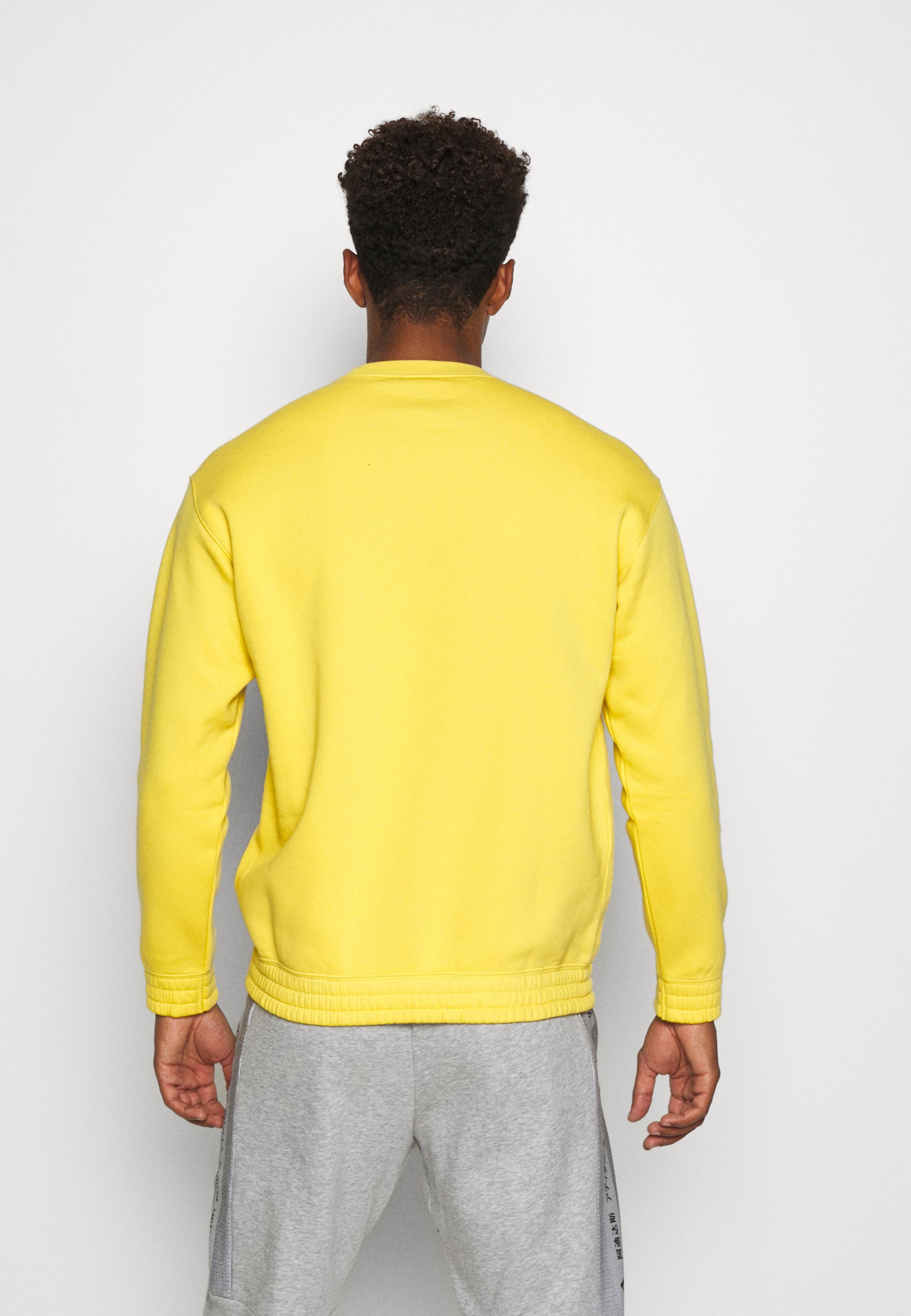 yellow champion crew neck sweatshirt