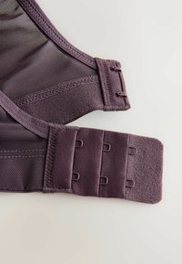 Purple bra with mesh detailing, soft texture, adjustable straps, and a hook-and-eye closure featuring multiple slots for size adjustments.