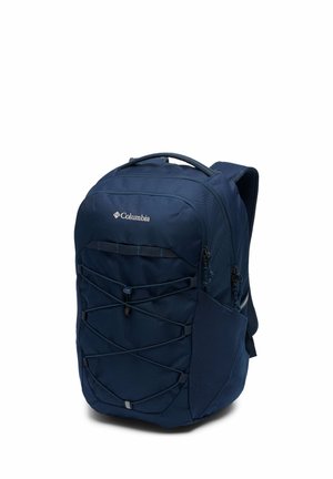 Sac à dos Columbia bleu marine avec cordon élastique à l'avant, poche latérale en mesh, poignée supérieure et bretelles rembourrées.
