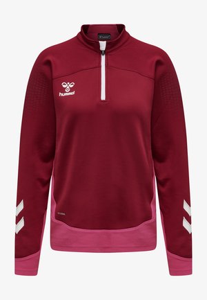 Bordeaux atletisk pullover med kvart-zip, hvidt logo, strukturerede ærmer og lyserøde detaljer ved kanten og manchetterne. Har side mesh-detaljer.