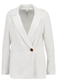 Bílý blazer s výstřihem do klop, jedním zelenohnědým knoflíkem a dvěma předními kapsami. Hladká textura, dlouhé rukávy, střih na míru.