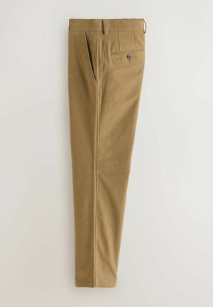 Brune bukser lavet af tekstureret bomuldsblandingsstof, med sidelommer, en baglomme med en sort knap, og et lige ben-design.
