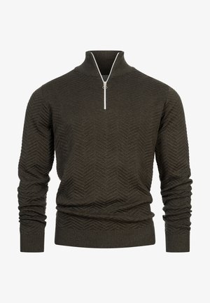 Sötétzöld pulóver magas gallérral és fél cipzárral. Hézagolt halszálka minta és bordás mandzsetták, valamint alj jellemzi.