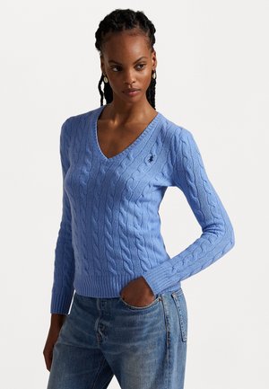 Cable-knit v-neck sweater in light blue, featuring long sleeves and ribbed hem. Small logo accent on the left side.