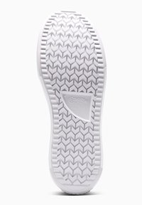 Suela de zapato de goma blanca con un patrón de banda de rodadura en zigzag, con un logotipo central encerrado en una insignia triangular que dice "Converse All Star".