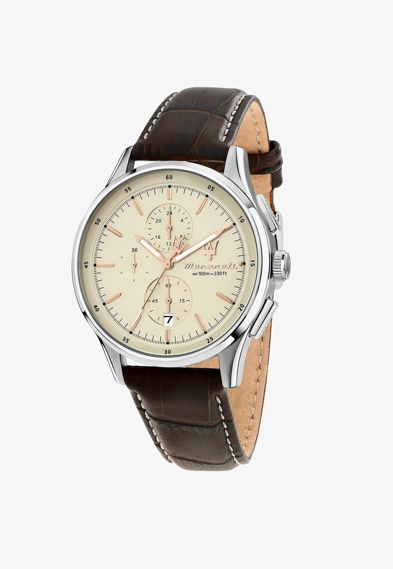 Bruin lederen horloge met een zilveren roestvrijstalen kast, crème wijzerplaat, bruine accenten, subdials en datumaanduiding op 6 uur. Waterbestendig tot 100 meter.