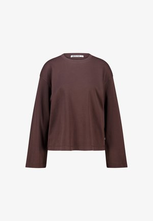 Brown long-sleeve shirt made of soft cotton, featuring a crew neck and a relaxed fit, with stitched hem detailing and a label at the side.