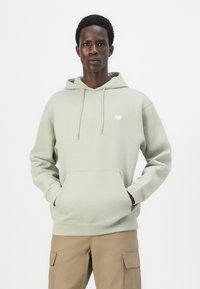 New Balance SPORT ESSENTIALS HOODIE UNISEX - Sweater - green