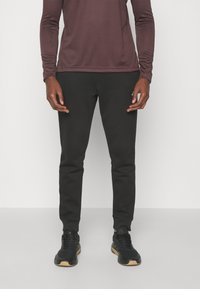 adidas Sportswear ESSENTIALS - Teplákové kalhoty - black