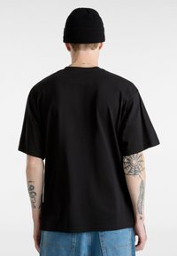 Vans RATTLER - Camiseta estampada - black
