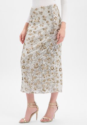 - Spódnica ołówkowa