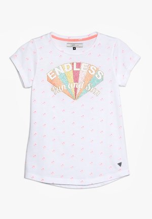 Valkoinen lyhythihainen t-paita, jossa on pieniä vaaleanpunaisia kukkakuoseja ja rinnan kohdalla sateenkaarenvärinen, kimaltava teksti "ENDLESS Fun and Sun".