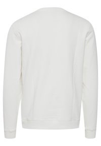 Felpa bianca, tessuto morbido, collo a giro, maniche lunghe, polsini e orlo a coste, design minimalista, senza motivi o grafiche.