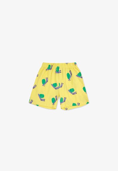Shorts en coton jaunes avec une taille élastique, ornés de motifs d'escargots verts et violets. Design simple et décontracté.
