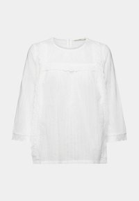 Blouse blanche à manches longues avec col rond, tissu texturé et bordure en dentelle le long du panneau avant et des poignets.