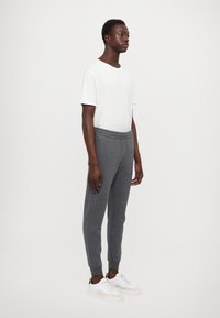 EA7 Emporio Armani PANTALONI - Tréningruha alsók - dark grey mel