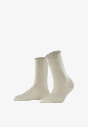 Beige Baumwollsocken mit glatter Textur und gerippten Bündchen, mit abgerundetem Zehenbereich und minimalistischem Design, geeignet für verschiedene Anlässe.
