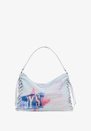 Lichtblauwe stoffen tas met een gebogen vorm, voorzien van veterdetails aan de zijkanten en kleurrijke prints in roze en blauw.