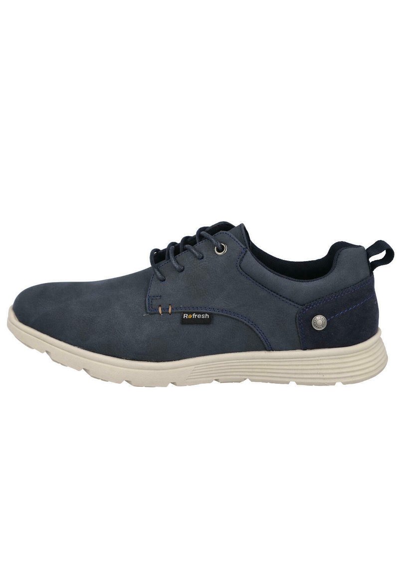 Zapatos de ante azul marino con suela de goma, punta redonda y diseño minimalista, con cordones y un acento de logo en el lateral.