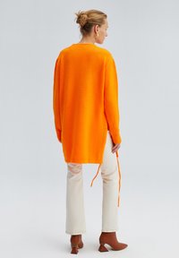 Touché Privé Vesta - orange