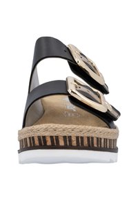 Sandales noires avec deux sangles à boucles dorées, semelle intérieure en liège, semelle intermédiaire en jute tressé et semelle texturée avec un accent à motif.