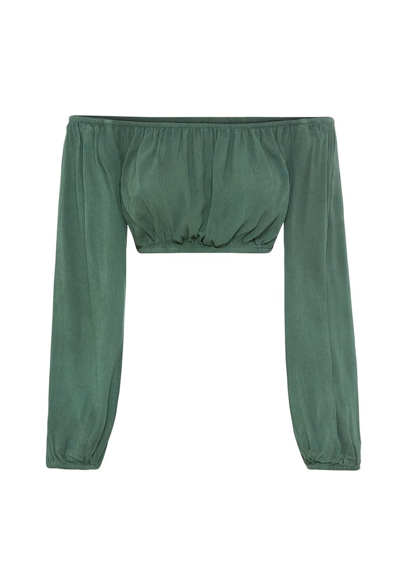 Blusa de ombros à mostra, com mangas longas, em um tecido texturizado verde profundo; apresenta punhos elásticos e um corpete franzido para um silhueta ajustada.