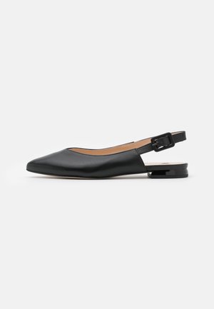 Black leather slingback flat shoe with a pointed toe, adjustable buckle strap, and a low, glossy heel. Smooth texture and minimal design.