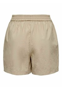 Beige shorts gemaakt van textuurstof, met een elastische tailleband en een relaxte pasvorm, zonder zichtbare zakken of extra details.
