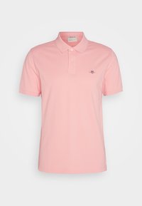 Pánska svetloružová polokošeľa s krátkym rukávom, golierom, zapínaním na dva gombíky a s malým vyšívaným logom na ľavej strane hrude.