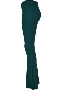 Geribbelde gebreide flared leggings in een diepe teal kleur met een hoge tailleband, met een aansluitende pasvorm en een flared onderkant.