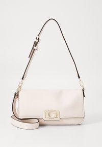 Borsa in pelle beige chiaro con una superficie liscia, hardware tono oro e una chiusura accentuata dal logo. Dotata di una tracolla regolabile.