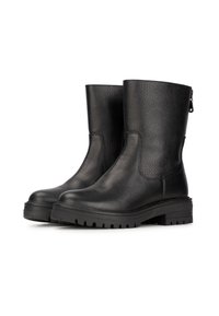 Botas de tobillo de cuero negro con un acabado texturizado, punteras redondeadas, suelas de goma resistentes y una cremallera lateral para ponérselas fácilmente.